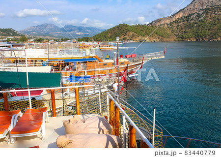 People having fun at yacht on the shore of the cozy bay of Adrasan, near Antalya and Kemer, Turkey People having fun at yacht on the shore of the cozy bay of Adrasan, near Antalya and Kemer, Turkey 83440779