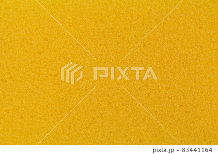 texture of yellow dishwashing sponge, close-up 83441164