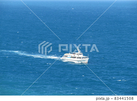 White ship sailing on the blue sea White ship sailing on the blue sea 83441508