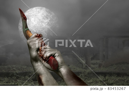 Zombie hands with wound holding ax 83453267