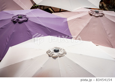 Close-up of a group of beach umbrellas - Photography full frame 83454154