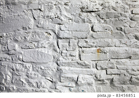 Old fashioned dirty grey painted brick stone wall background Old fashioned dirty grey painted brick stone wall background 83456851