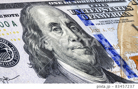 Portrait of Benjamin Franklin from one hundred american dollars banknote 83457237