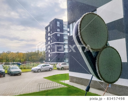 Vacuum cleaner robot washing glass window. Robot window cleaner 83457498