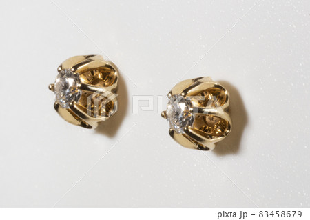 Beautiful earrings with natural diamonds 0.1 carats each. Jewelry with a yellow gold frame in the shape of a tulip 83458679