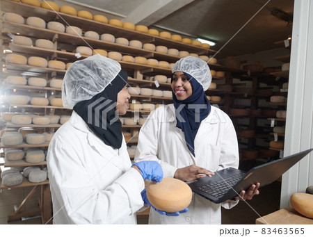 business woman team in local cheese production company business woman team in local cheese production company 83463565