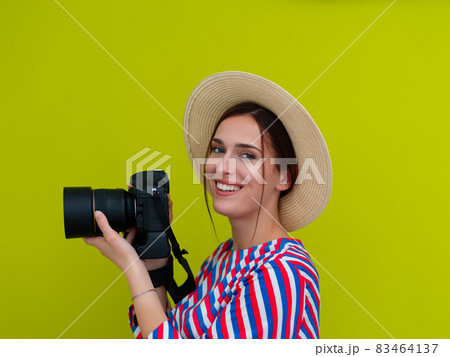 Portrait of beautiful female photographer close up Portrait of beautiful female photographer close up 83464137