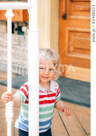 Cute little happy blond child Cute little happy blond child 83466033
