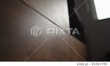 low angle shot of black walnut under tv cabinet 83467706