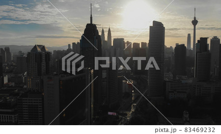 Aerial view of the silhouette of skyscrapers and the city center of Kuala Lumpur. Aerial view of the silhouette of skyscrapers and the city center of Kuala Lumpur. 83469232