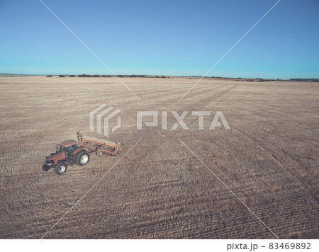 Tractor and seeder, direct sowing in the pampa, Argentina 83469892