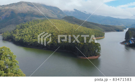 Aerial view beautiful nature with mountains and hills by Lake Mattupetty. Kerala State. Near the city of Munar. 83471583