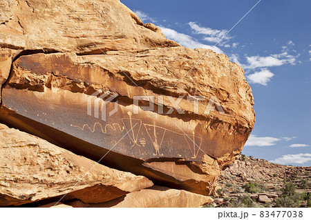 ancient rock art with snake 83477038