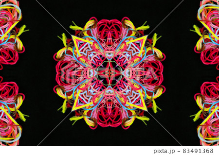 Abstract pattern of multicolored threads on a black background 83491368