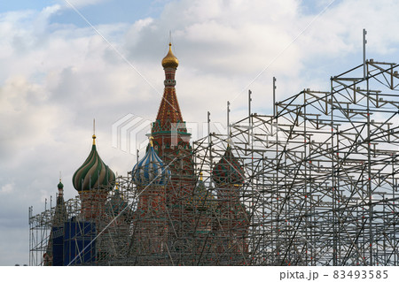 Photography of bright colorful fragment of the Domes of the famous Saint Basil's Cathedral at the Red Square. Concept of the beauty and history. High angle view. Close up photography Photography of bright colorful fragment of the Domes of the famous Saint Basil's Cathedral at the Red Square. Concept of the beauty and history. High angle view. Close up photography 83493585