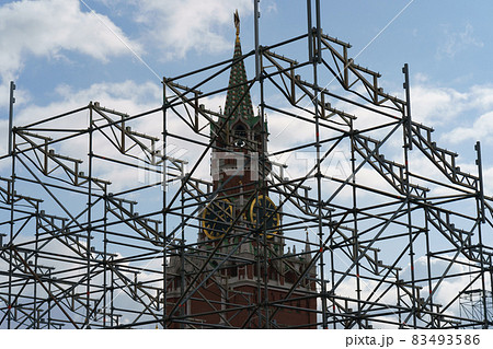 Photography of Spasskaya Tower of the Moscow Kremlin. Kremlin chimes designates official Moscow Time. UNESCO World Heritage Site. High angle view. Photography of Spasskaya Tower of the Moscow Kremlin. Kremlin chimes designates official Moscow Time. UNESCO World Heritage Site. High angle view. 83493586