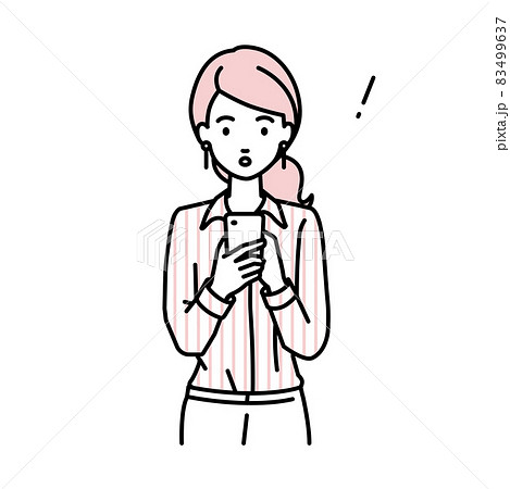 立ってスマートフォンを操作して何かに気づいて驚いたブラウスの女性 83499637
