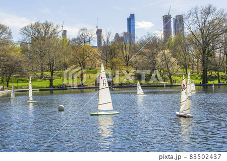 People come to enjoy spring weather at Conservatory Water in Central Park in New York,USA People come to enjoy spring weather at Conservatory Water in Central Park in New York,USA 83502437