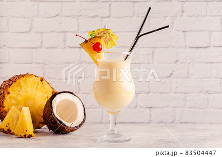 Traditional caribbean cocktail pina colada in a glass. Traditional caribbean cocktail pina colada in a glass. 83504447