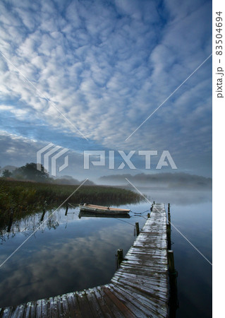 Lake and boat in Denmark in Autumn 83504694