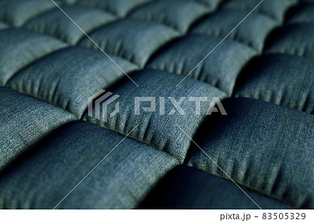 3D illustration of a realistic sofa structure. 3D graphics, gray little pillows, sofa cover. 3D graphics, close-up 83505329