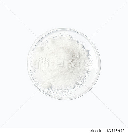 Closeup chemical ingredient on white laboratory table. Di-Ammonium Prosphate in Chemical Watch Glass. Top View 83513945