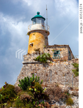 Kerkyra. Greece. Old stone lighthouse in the old fort. 83515374