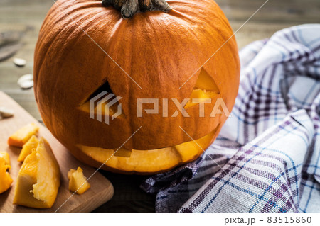 Halloween Jack-o-lantern carved pumpkin. Making backstage. 83515860