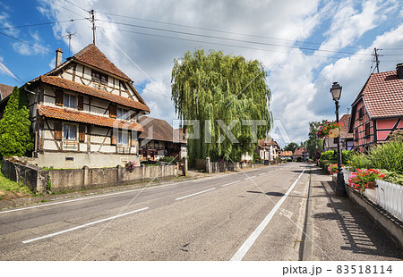 Colorful ornamented facades in medieval town Waldighoffen, Alsace, France, Europe 83518114