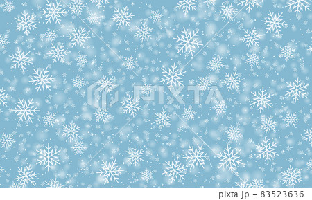 Snow background. Winter snowfall. White snowflakes on blue sky. Christmas background. 83523636
