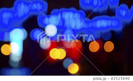 Colored blurred bokeh. abstract background of included festive garlands. colorful blur light bulbs Colored blurred bokeh. abstract background of included festive garlands. colorful blur light bulbs 83525640