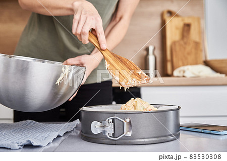 Woman cooking cake at kitchen 83530308