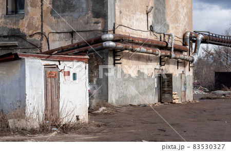 abandoned industrial zone, warehouses, in winter abandoned industrial zone, warehouses, in winter 83530327