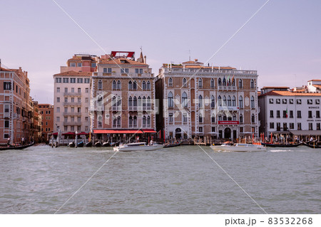 Panoramic view of Grand Canal (Canal Grande) with active traffic boats Panoramic view of Grand Canal (Canal Grande) with active traffic boats 83532268