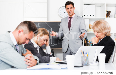 Angry boss blowing up his subordinates 83533796