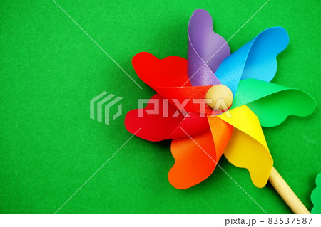 colorful pinwheel with space copy isolated on green background 83537587