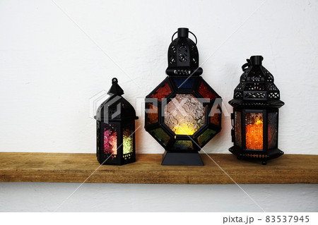 Ramadan Lantern Arabic decoration on wooden table and white wall background 83537945