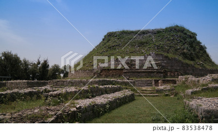 View of the Dharmarajika stupa in Taxila ruins Pakistan 83538478