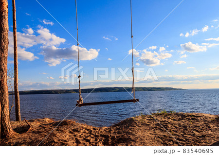 Rope swing on a shore of the Dnieper river in Ukraine 83540695