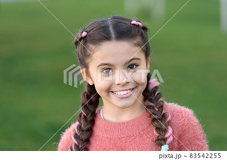 Small girl with pretty face relaxing outdoors. Beautiful Small girl with pretty face relaxing outdoors. Beautiful 83542255