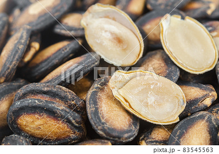 Black dry watermelon seeds texture. 83545563