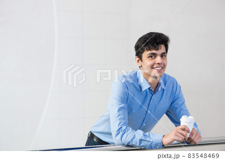 close-up portrait of a man with coffee close-up portrait of a man with coffee 83548469