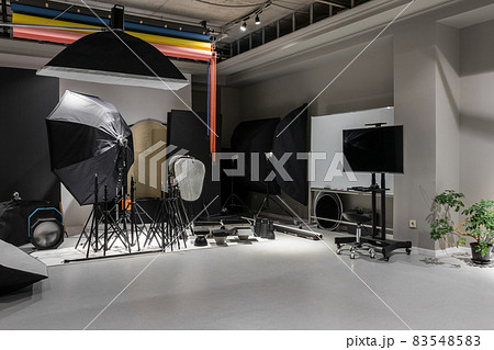 Interior of a modern photo studio. Technics and equipment Interior of a modern photo studio. Technics and equipment 83548583