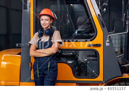 female labor worker near forklift driver in industry factory logistic shipping warehouse. female labor worker near forklift driver in industry factory logistic shipping warehouse. 83551157