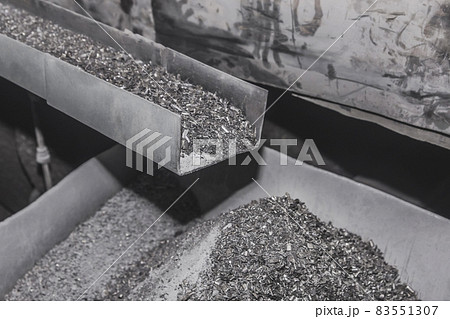 Pile of metal shavings background, industrial iron waste and steel recycle industry 83551307