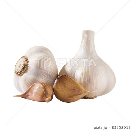 Organic garlic cloves and bulbs isolated on white background. Organic garlic cloves and bulbs isolated on white background. 83552012
