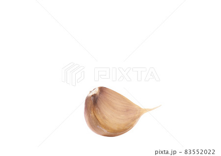 unpeeled cloves garlic isolated on white background. unpeeled cloves garlic isolated on white background. 83552022