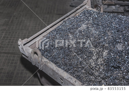 Pile of metal shavings background, industrial iron waste and steel recycle industry 83553155