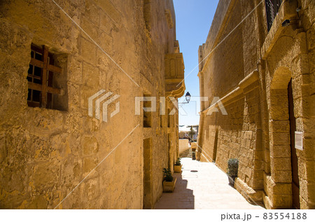 Narrow stone streets, Victoria Rabat, Gozo island, Malta Narrow stone streets, Victoria Rabat, Gozo island, Malta 83554188