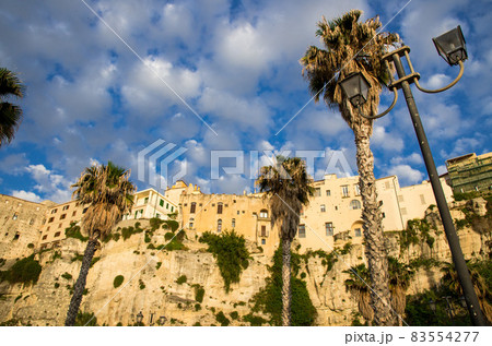 Tropea town colorful stone buildings on top of cliff, Calabria, Italy 83554277